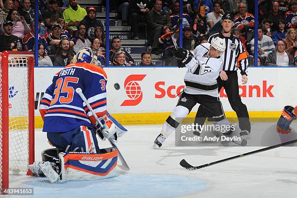 Marian Gaborik of the Los Angeles Kings takes a shot on Viktor Fasth of the Edmonton Oilers on April 10, 2014 at Rexall Place in Edmonton, Alberta,...