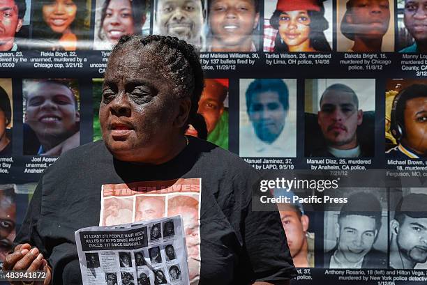 Juanita Young, whose son Malcolm Ferguson was killed by police in the Bronx in 2000 speaks to the crowd at the rally. Members of the Stop Mass...