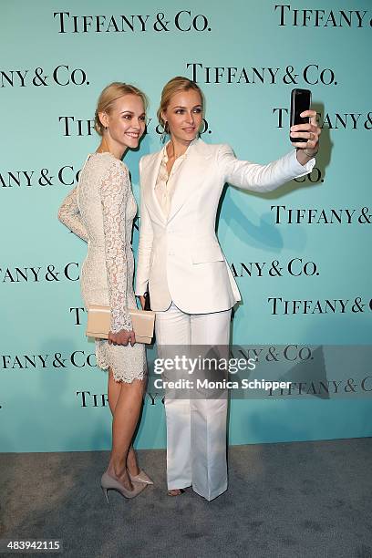 Models Ginta Lapina and Valentina Zelyaeva attend the 2014 Tiffany's Blue Book Gala at the Guggenheim Museum on April 10, 2014 in New York City.