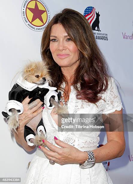 Lisa Vanderpump and Giggy attend her luncheon benefitting the American Humane Association and the Hero Dog Awards at Pump on August 13, 2015 in West...