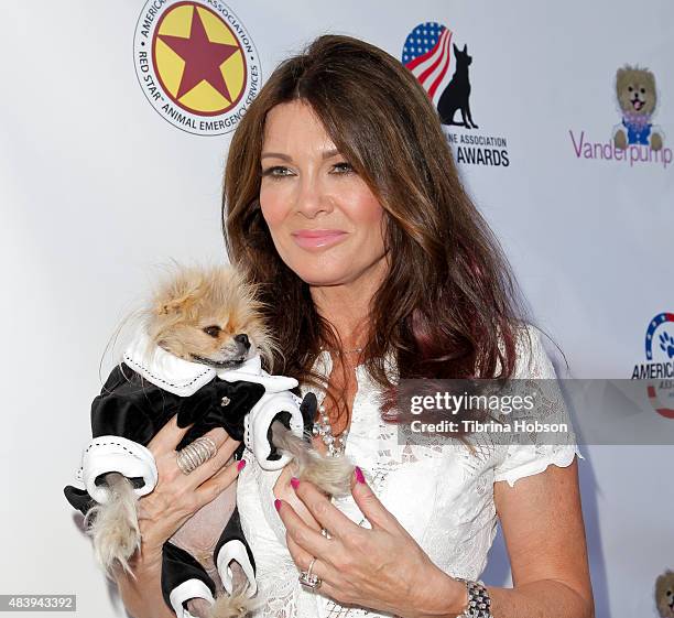 Lisa Vanderpump and Giggy attend her luncheon benefitting the American Humane Association and the Hero Dog Awards at Pump on August 13, 2015 in West...