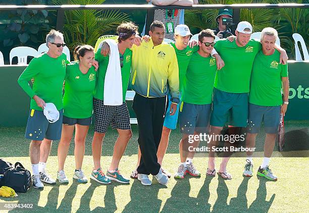 The Australian team including captain Wally Masur, John Millman, Sam Groth, Thanasi Kokkinakis and Nick Kyrgios look on as teammate Lleyton Hewitt of...