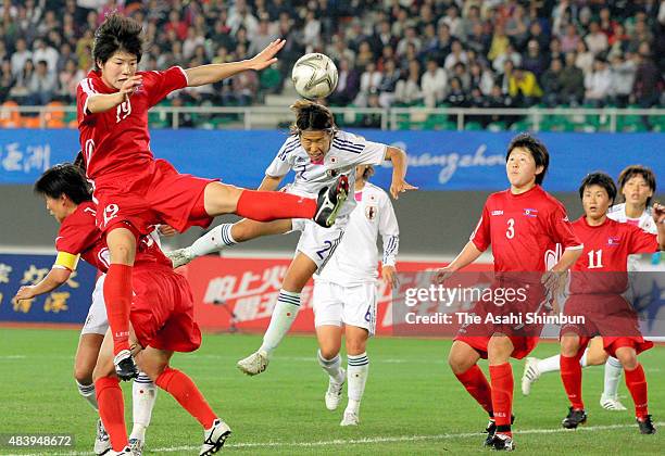 Azusa Iwashimizu of Japan scores her team's first goal during the Women's Football Final match between North Korea and Japan in day ten of the...