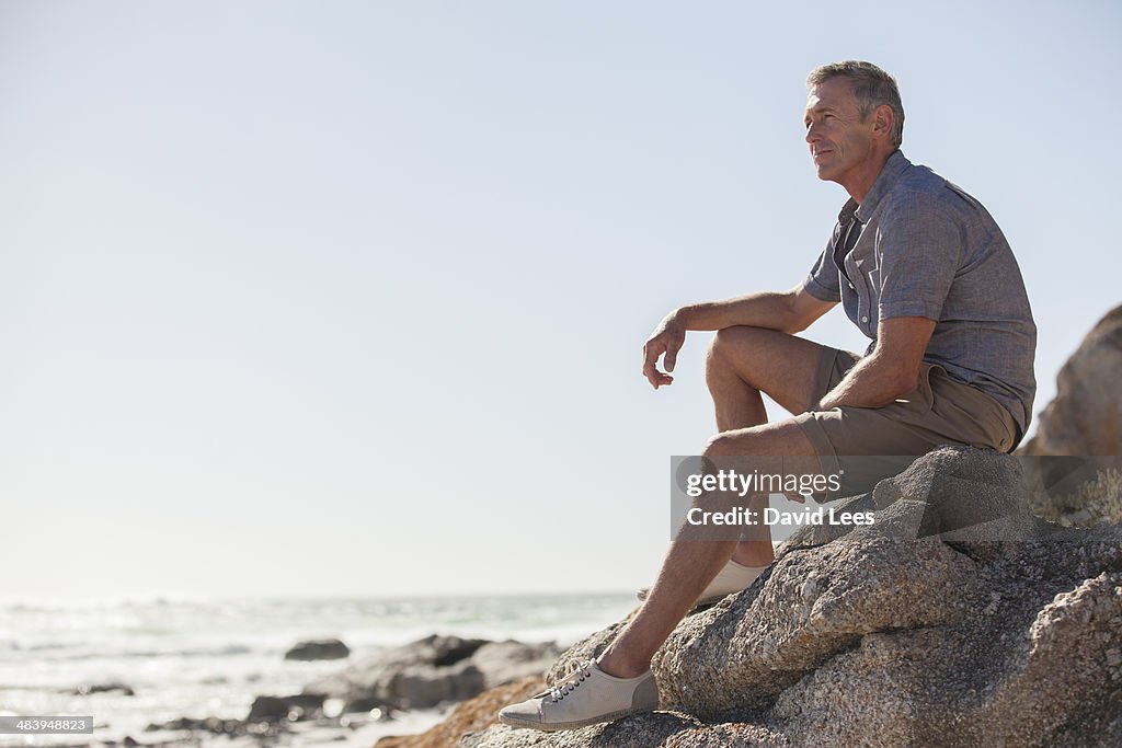 Mature man relaxing on beach