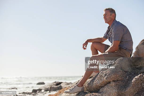 Mature Man Relaxing On Beach, 照片檔