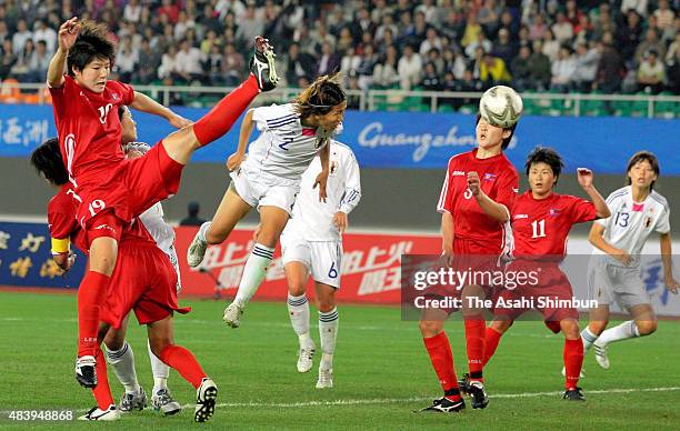 Azusa Iwashimizu of Japan scores her team's first goal during the Women's Football Final match between North Korea and Japan in day ten of the...