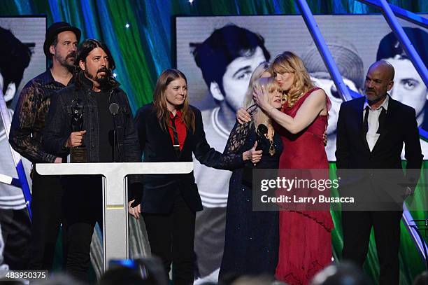 Krist Novoselic, Dave Grohl, Kimberly Cobain, Wendy O'Connor, Courtney Love and Michael Stipe pose onstage at the 29th Annual Rock And Roll Hall Of...