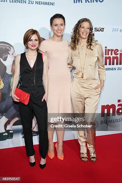 Josefine Preuss, Peri Baumeister, Marie Baeumer attend the premiere of the film 'Irre sind maennlich' at Mathaeser Filmpalast on April 10, 2014 in...