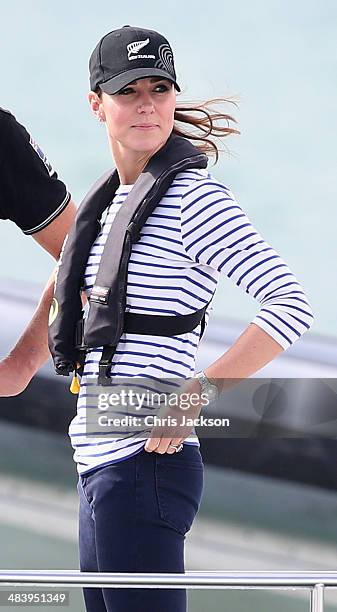 Catherine, Duchess of Cambridge on board an America's Cup yacht as she races Prince William, Duke of Cambridge in Auckland Harbour on April 11, 2014...