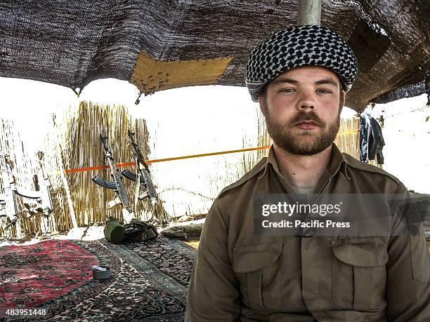 Ryan O'leary, a 28 years old American volunteer member of PDKI wears Kurdish clothes. He joined as volunteer with PDK-I in the north of Iran at the...