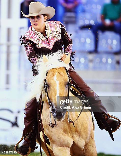 Gina Schumacher, daughter of former German Formula One driver Michael Schumacher, presents the elements of the reining competition on her horse Sharp...