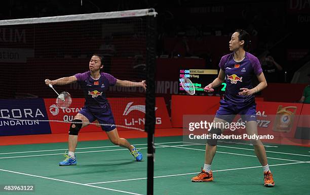 Tian Qing and Zhao Yunlei of China compete against Wang Xiaoli and Yu Yang of China in the quarter final match of the 2015 Total BWF World...