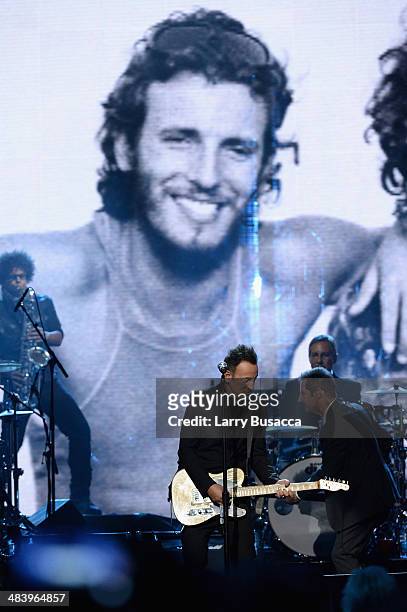 Musician Bruce Springsteenperforms onstage with Garry Tallent and Max Weinberg of the E Street Band at the 29th Annual Rock And Roll Hall Of Fame...