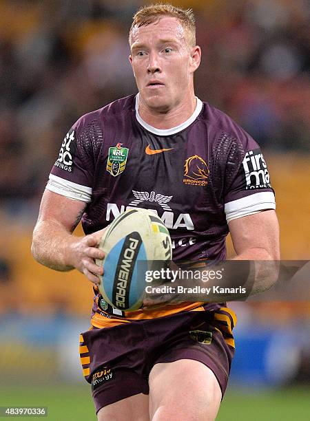 Jack Reed of the Broncos runs with the ball during the round 23 NRL match between the Brisbane Broncos and the St George Illawarra Dragons at Suncorp...