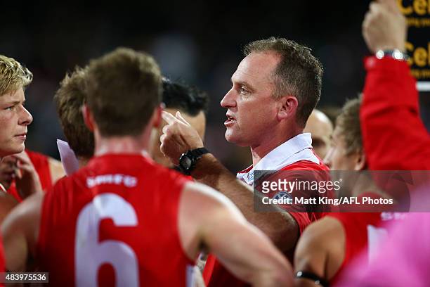 Swans head coach John Longmire speaks to his players dduring the round 20 AFL match between the Sydney Swans and the Collingwood Magpies at SCG on...