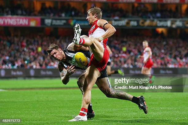 Dane Swan of the Magpies is challenged by Kieren Jack of the Swans during the round 20 AFL match between the Sydney Swans and the Collingwood Magpies...