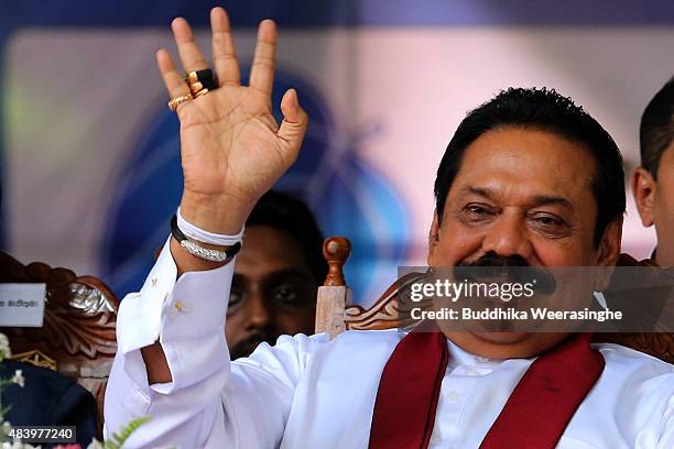 Former Sri Lankan president and parliamentary candidate Mahinda Rajapaksa waves to supporters during his partyfs final day of election campaign...