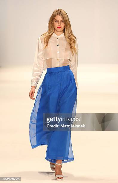 Model walks the runway wearing designs by Daniel K at the New Generation show at Mercedes-Benz Fashion Week Australia 2014 on April 10, 2014 in...