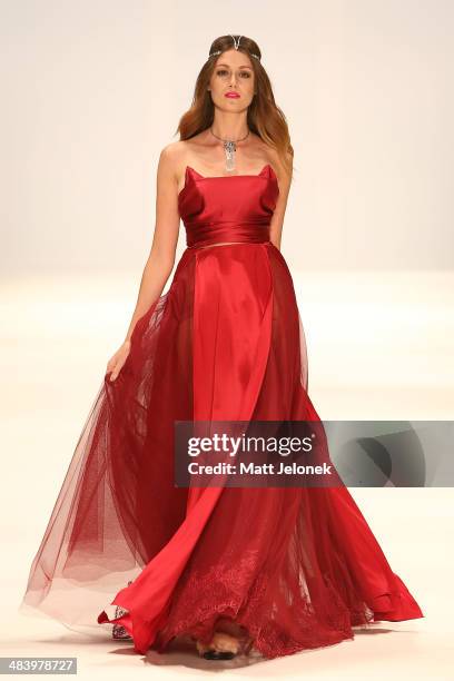 Model walks the runway wearing designs by Dyspnea at the New Generation show at Mercedes-Benz Fashion Week Australia 2014 at on April 10, 2014 in...