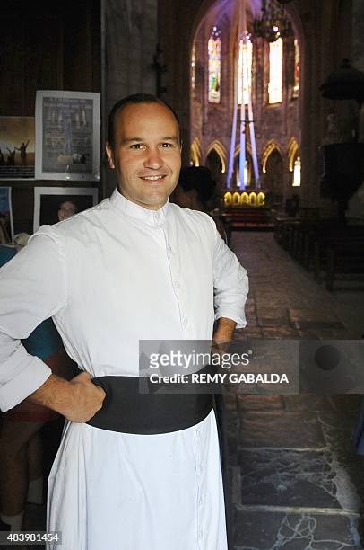 Father Guillaume Soury-Lavergne poses on August 12, 2015 in the Benedictine abbey of Marcilhac-sur-Cele, in the Lot gorges, southern France. After...