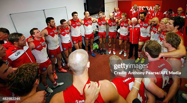 Swans players celebrate with a team song during the round 20 AFL match between the Sydney Swans and the Collingwood Magpies at SCG on August 14, 2015...