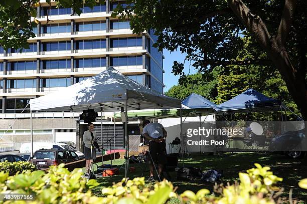 Members of the media broadcast outside Dumas House which contains the Joint Agency Coordination Centre in the search for missing Malaysia Airlines...
