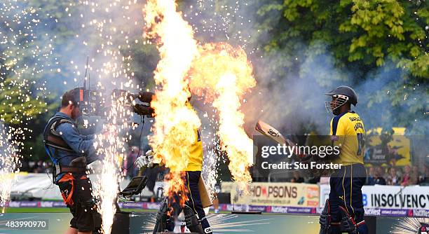 Hampshire batsmen Michael Carberry and James Vince make their way to the middle before the NatWest T20 Blast quarter final match between...