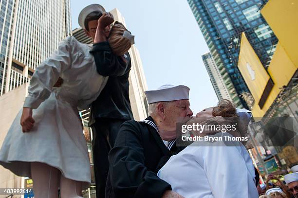 World War II Veterans Ray and Ellie Williams recreate the iconic Alfred Eisenstaedt photograph in Times Square on August 14, 2015 in New York City....