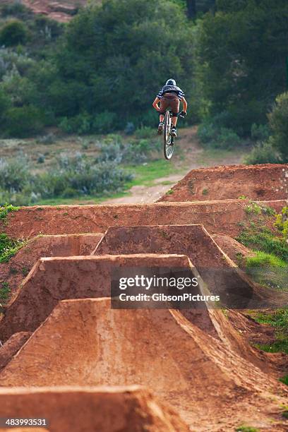 mountain bike jump - bmx park stock pictures, royalty-free photos & images