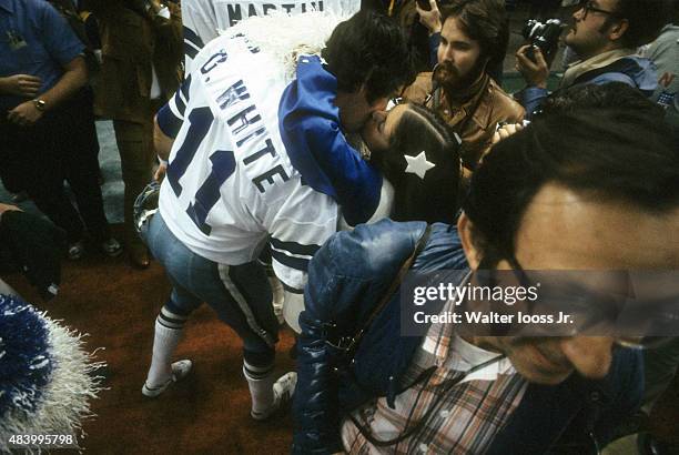 Super Bowl XII: Dallas Cowboy backup QB Danny White victorious, kissing cheerleader after winning game vs Denver Broncos at Louisiana Superdome. New...