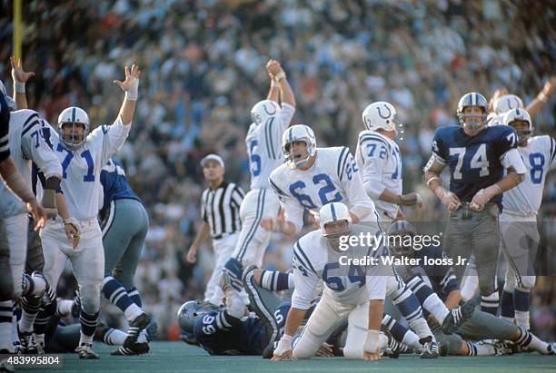 Super Bowl V: Baltimore Colts Tom Goode and Glenn Ressler watch as teammate Jim O'Brien scores 32-yard, game winning field goal kick vs Dallas...