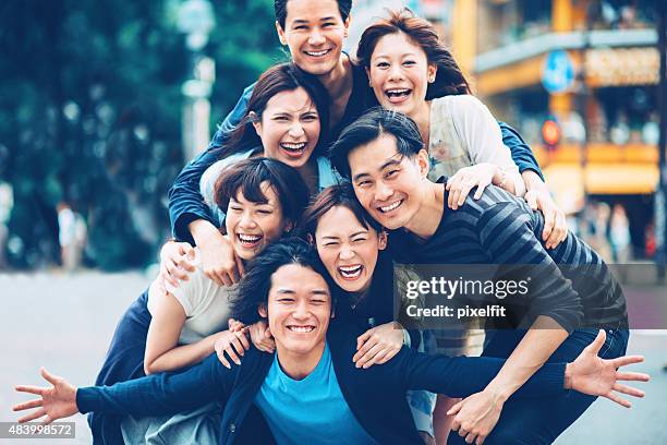 friendship - crowd laughing stock pictures, royalty-free photos & images