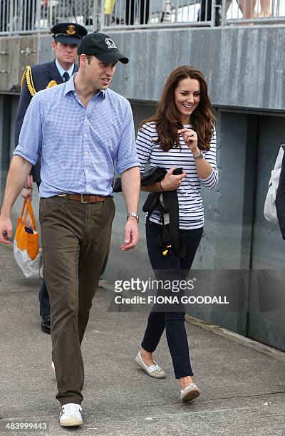 Britain's Prince William and his wife Catherine , Duchess of Cambridge, return from sailing with Team New Zealand at Auckland's Viaduct Harbour, on...
