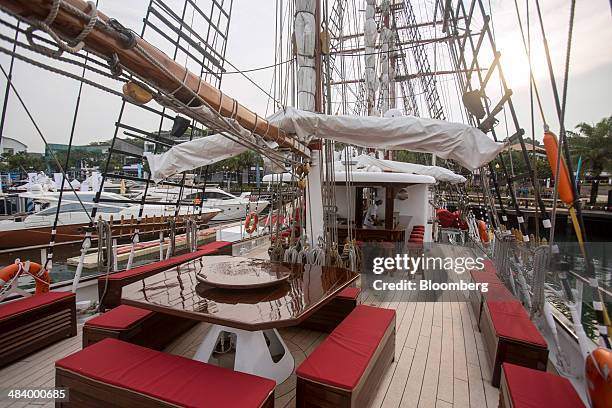 The aft seating area and bar of the Royal Albatross tall ship, operated by Tall Ship Adventures Pte, are seen at the Singapore Yacht Show in...