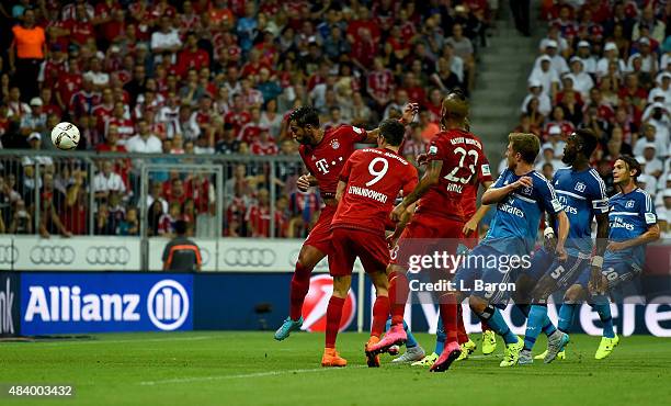 Mehdi Benatia of Muenchen scores his teams first goal during the Bundesliga match between FC Bayern Muenchen and Hamburger SV at Allianz Arena on...