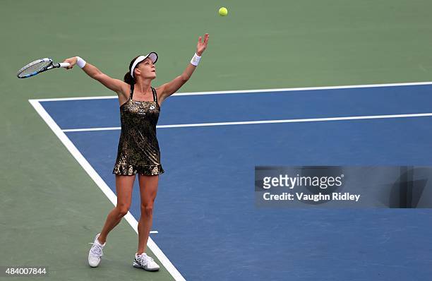 Agnieszka Radwanska of Poland serves against Simona Halep of Romania during Day 5 of the Rogers Cup at the Aviva Centre on August 14, 2015 in...