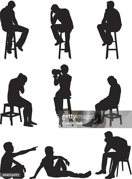 people sitting sadness - head in hands silhouette stock illustrations