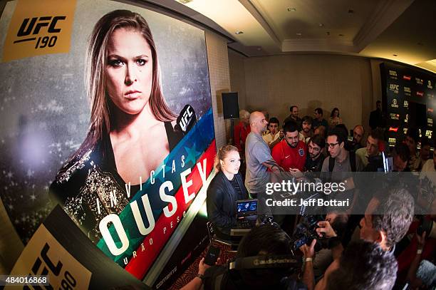 Women's bantamweight champion Ronda Rousey interacts with the media during the UFC 190 Ultimate Media Day at the Sheraton Rio Hotel on July 30, 2015...