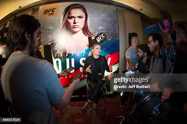 Women's bantamweight champion Ronda Rousey interacts with the media during the UFC 190 Ultimate Media Day at the Sheraton Rio Hotel on July 30, 2015...