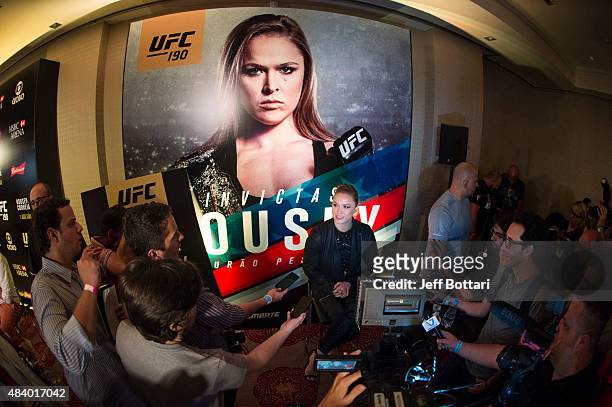 Women's bantamweight champion Ronda Rousey interacts with the media during the UFC 190 Ultimate Media Day at the Sheraton Rio Hotel on July 30, 2015...