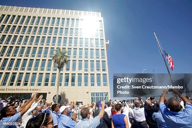 The American flag is raised at the U.S. Embassy in Cuba, on August 14 in Havana, Cuba. The first American Secretary of State to visit Cuba since...