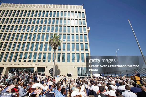 Secretary of State John Kerry gestures as he talks during the flag-raising ceremony, at the U.S. Embassy in Cuba on August 14 in Havana, Cuba. The...