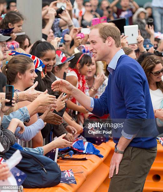 Prince William, Duke of Cambridge meets members of the public at Auckland Harbour in the rain on April 11, 2014 in Auckland, New Zealand. The Duke...