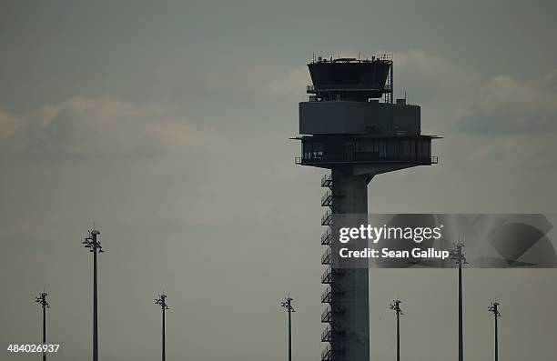 The control tower stands on the construction site of the new Willy Brandt Berlin Brandenburg International Airport on April 11, 2014 in Schoenefeld,...