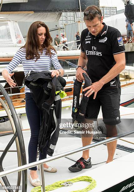 Catherine, Duchess of Cambridge boards the New Zealand's Americas Cup Team yacht during their visit to Auckland Harbour on April 11, 2014 in...