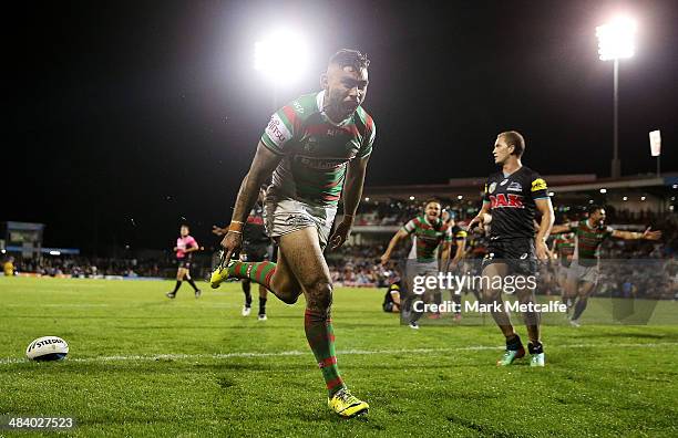 Nathan Merritt of the Rabbitohs celebrates scoring a try during the round 6 NRL match between the Penrith Panthers and the South Sydney Rabbitohs at...