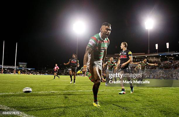 Nathan Merritt of the Rabbitohs celebrates scoring a try during the round 6 NRL match between the Penrith Panthers and the South Sydney Rabbitohs at...