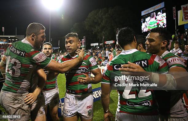 Nathan Merritt of the Rabbitohs celebrates scoring a try with team mate Sam Burgess during the round 6 NRL match between the Penrith Panthers and the...