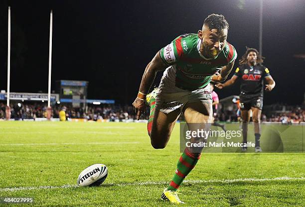 Nathan Merritt of the Rabbitohs celebrates scoring a try during the round 6 NRL match between the Penrith Panthers and the South Sydney Rabbitohs at...