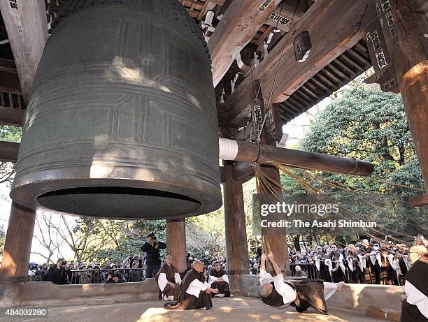 Buddhist monks ring the giant bell as a rehearsal of the 'Joya-no-Kane' ringing 108 times through the eve to the New Year at Chion-In Temple on...